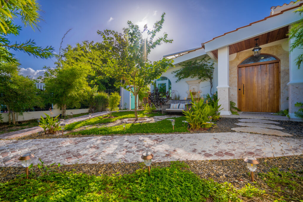 Courtyard custom teak door at Villa Coral, Dorado Del Mar