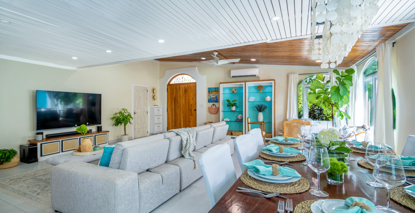 Living room and dining table for 12 at Villa Coral, Dorado Del Mar
