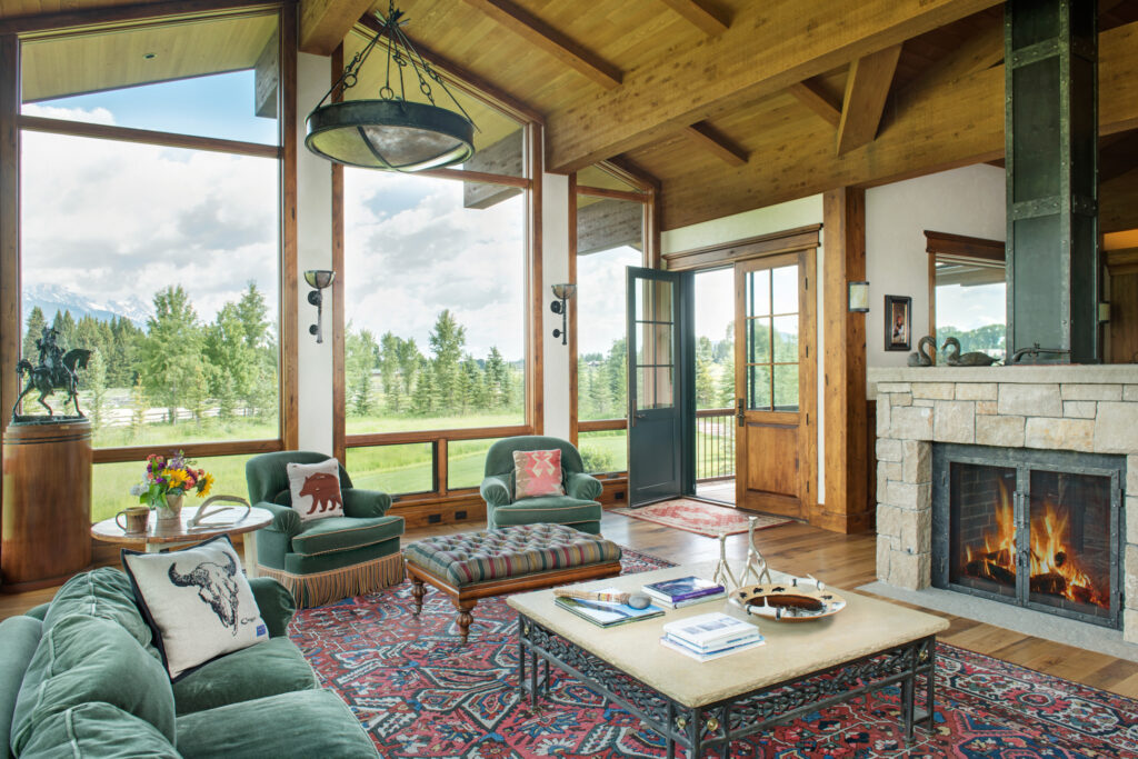 Living room with fireplace at the Gate House, Antelope Trails Ranch